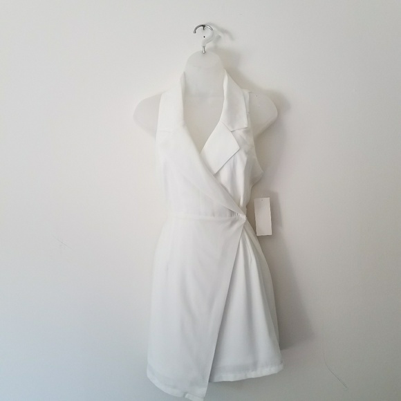 white sleeveless wrap dress
